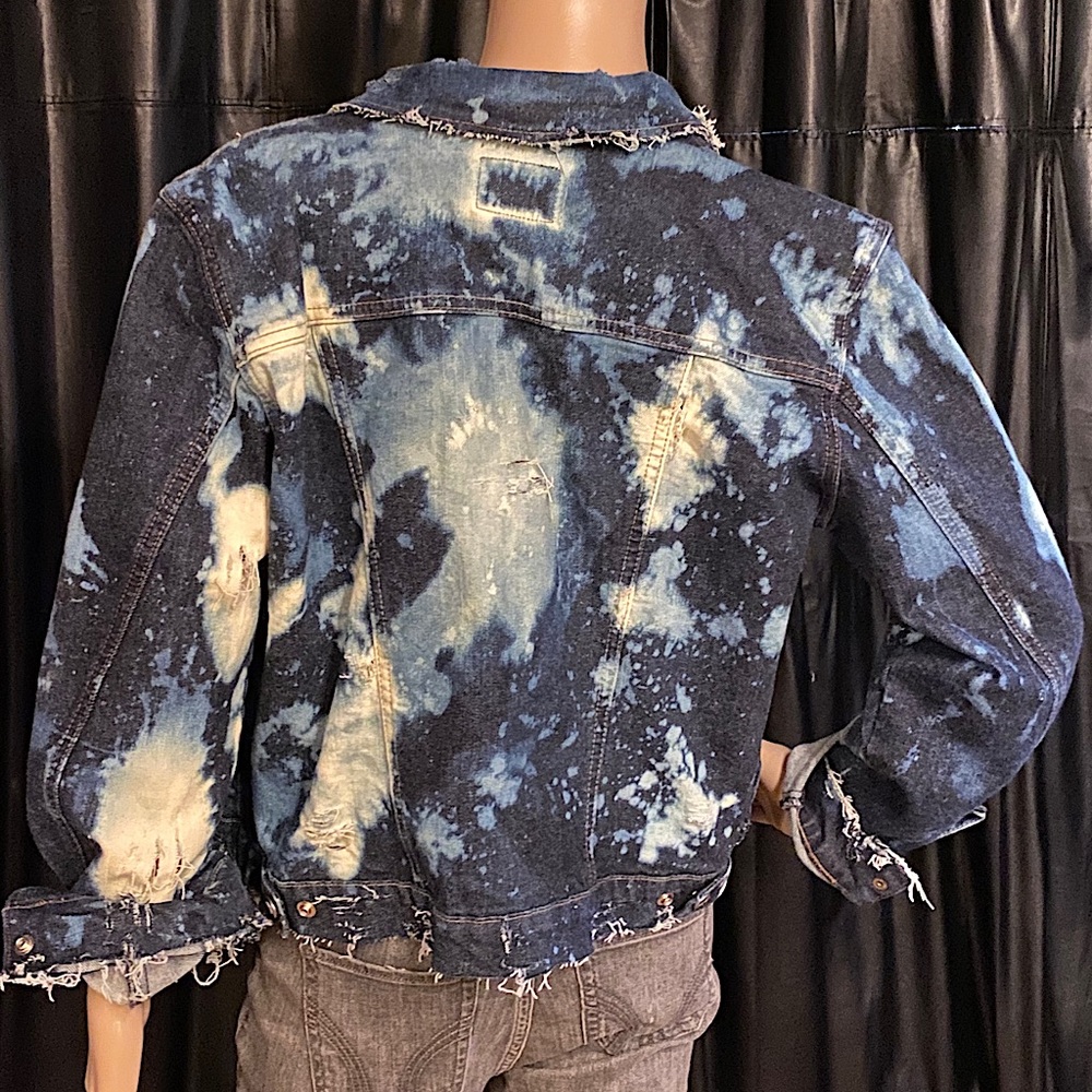Destroyed vintage denim jacket .